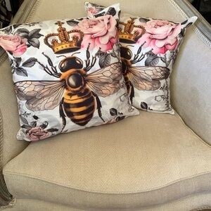 Two queen bee cushion covers with flowers and zippers
